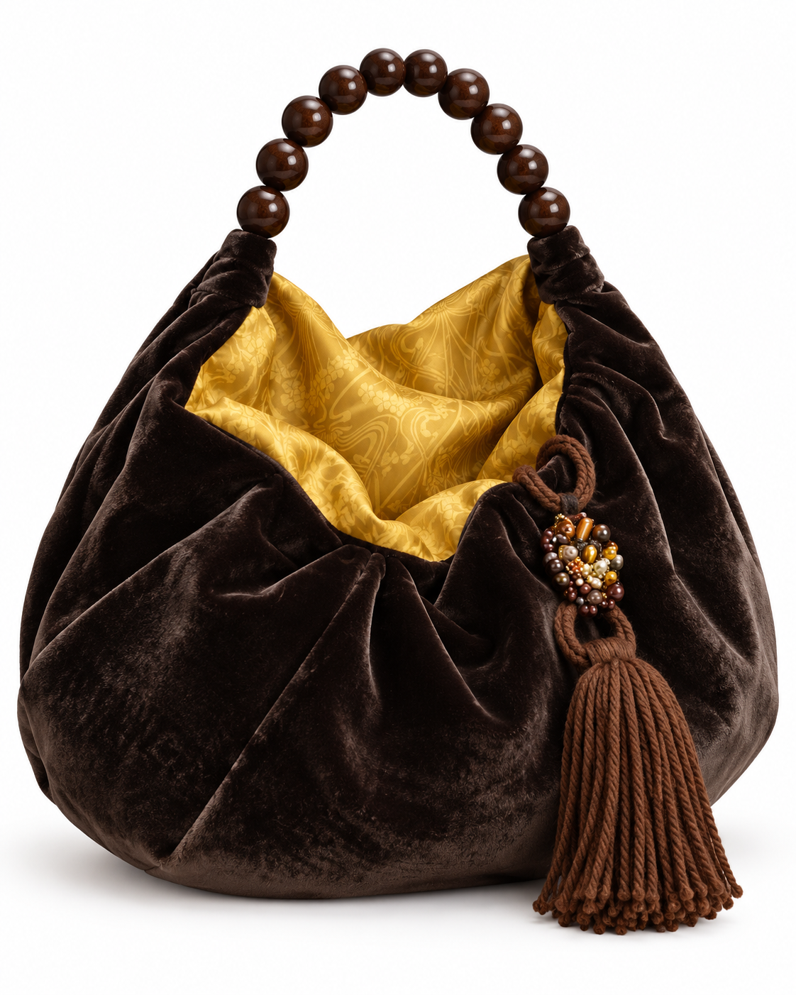 Borsa Navona in velluto marrone con manici gioiello e nappina in lana, collezione Eterna.